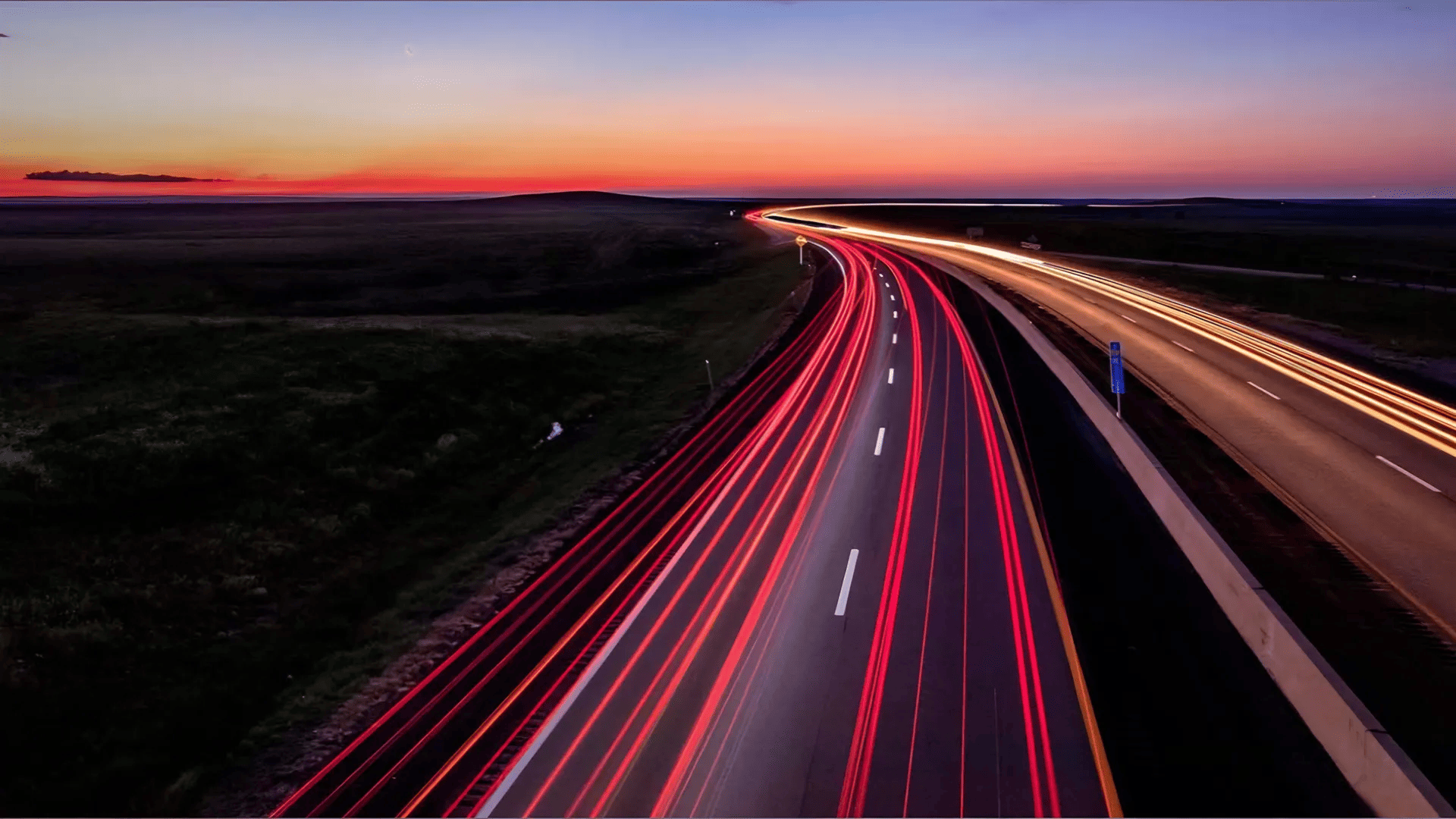 Light trails on a highway at dusk