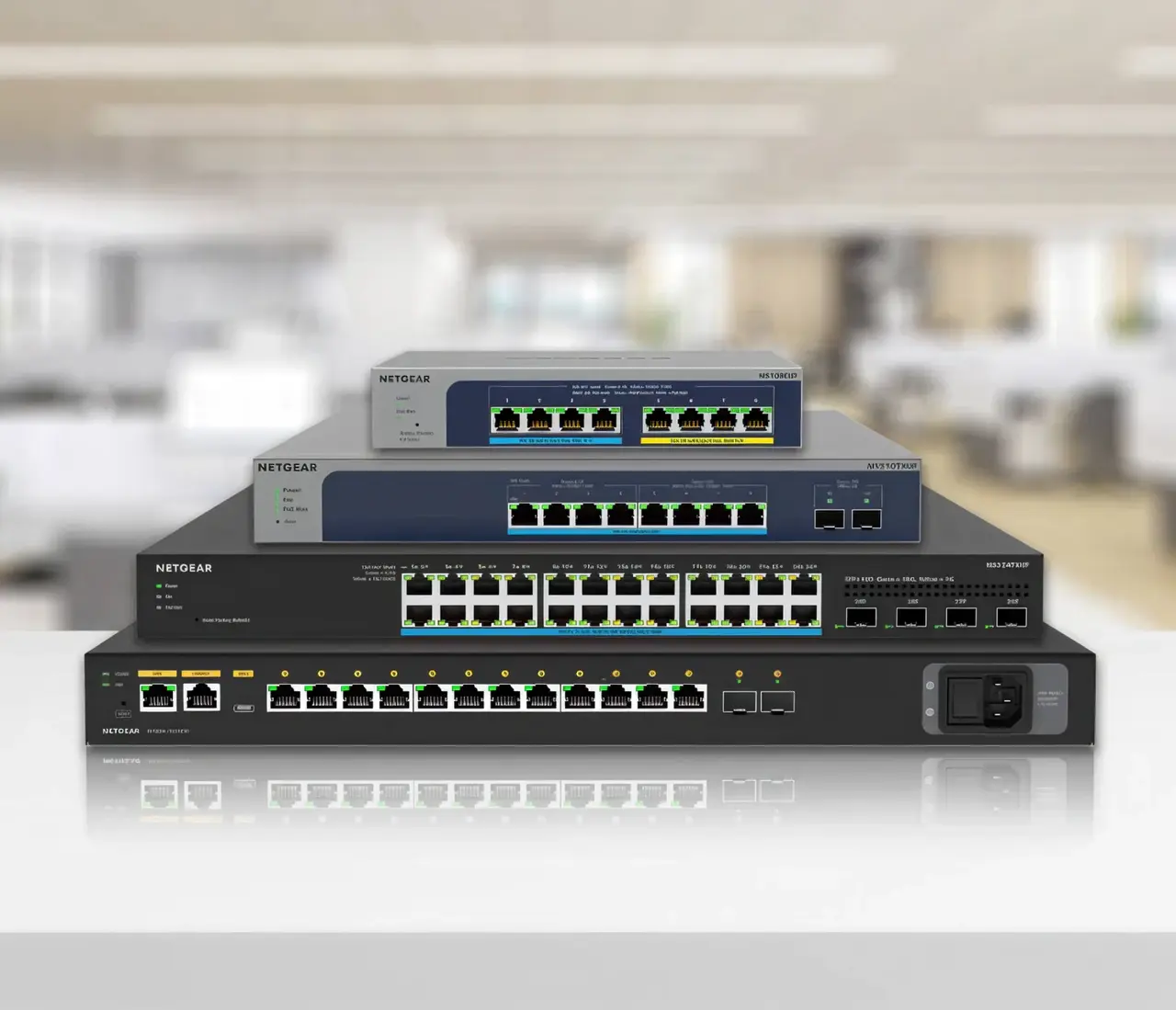 Stack of NETGEAR multi-gigabit switches