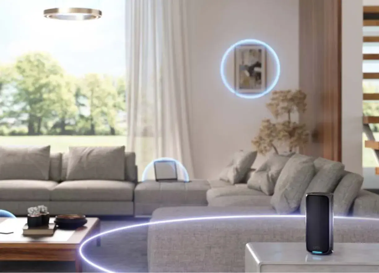 An Orbi mesh system in a bright living room