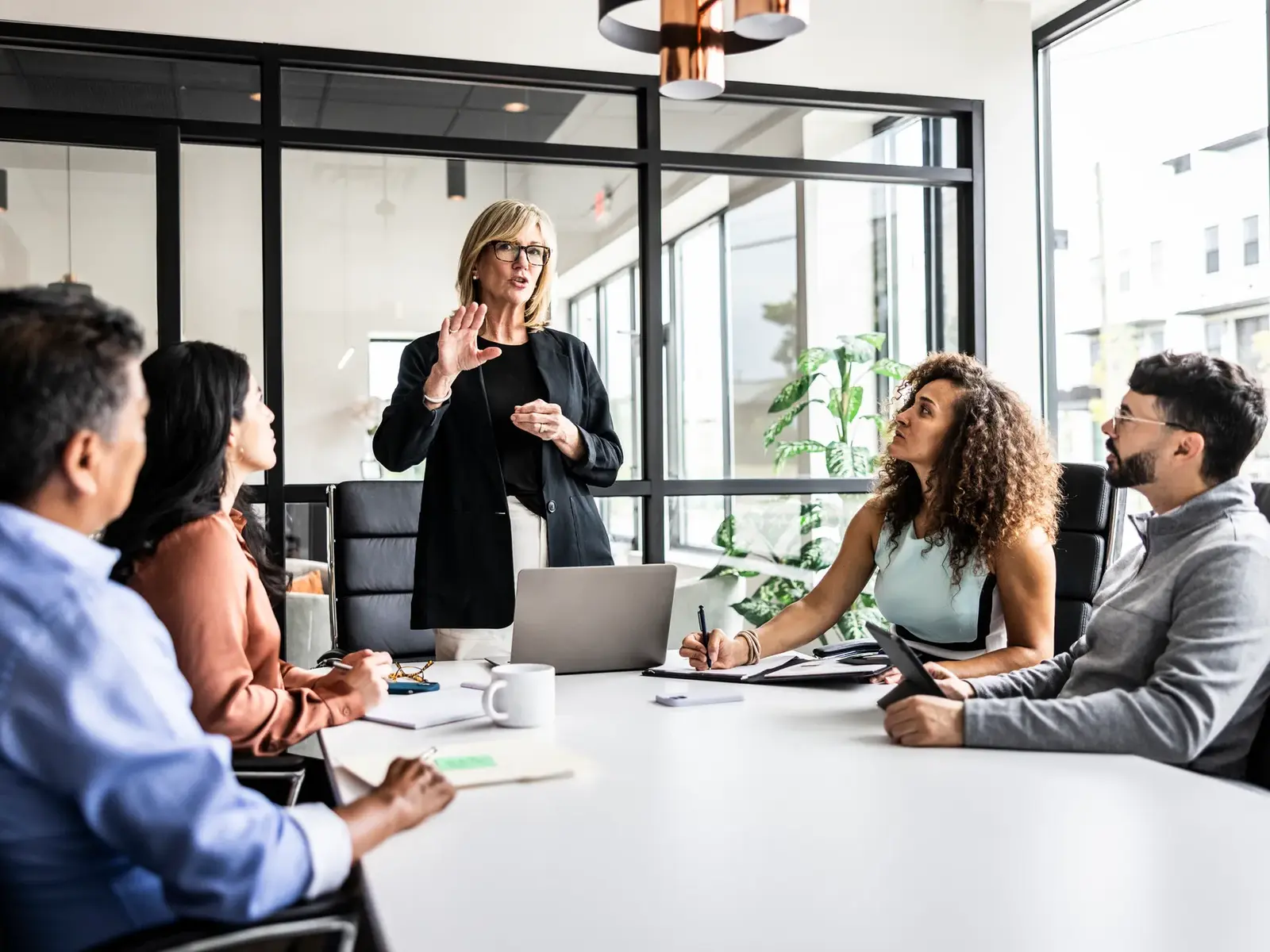 Business colleagues meeting in modern conference room